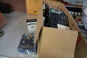 lot 49 image: &nbsp8 tracks, headset, Motorhead, CDs