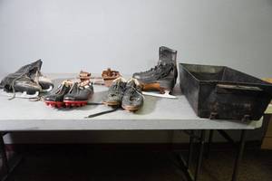 lot 79 image: Ice skates, cleats, metal ash tray