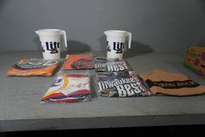 lot 120 image: 2) Miller Lite poly pitchers, Yukon Jack Hat, 5