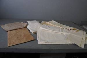 lot 2 image: Many pieces of neutral yardage