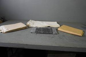 lot 7 image: Neutral colored fabric lengths