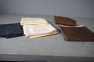 lot 25 image: Browns, neutrals & blue fabric lengths