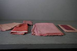 lot 26 image: A variety of dusty rose fabric lengths