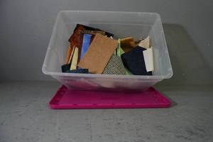 lot 28 image: Half full tub of fabric pieces