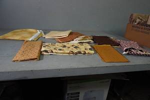 lot 60 image: Variety of brownbeige fabric lengths