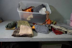 lot 73 image: Large tub of wool pieces