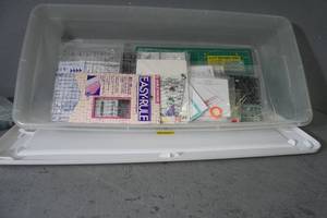lot 101 image: Many templates in plastic tray & rotary mat