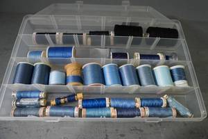 lot 103 image: Case of thread-Blue and Black