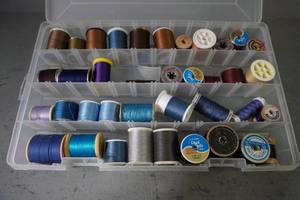 lot 108 image: Case of thread-Blues, Purple, Brown