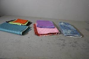 lot 110 image: Variety of fabric lengths-PurplePinkBlueEtc
