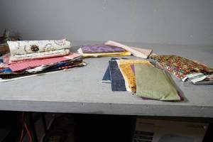 lot 111 image: Assorted fabric lengths & colors