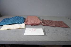 lot 114 image: Long lengths of Blue &amp Red fabric