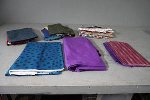 lot 118 image: Many colors of fabric lengths