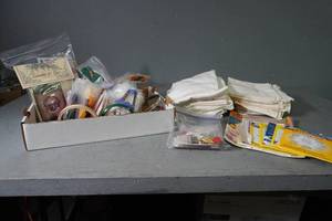 lot 125 image: Dishtowels & embroidery floss & hoops