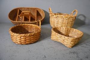 lot 136 image: Four larger baskets