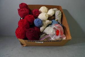 lot 146 image: Large box of many different color yarns