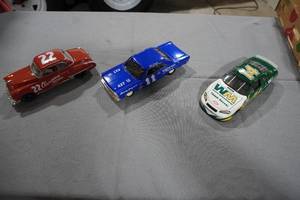 lot 278 image: Three Nascar Cars