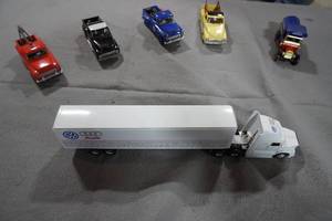 lot 285 image: Six different trucks, Semi, 50s Chev & Ford