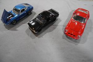 lot 295 image: Fast & Furious, Datson, Ferrari cars