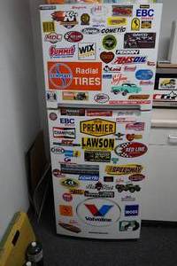 lot 307 image: Shop Whirpool Fridge Freezer with stickers