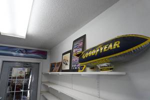 lot 313 image: Five prints and Blimp top shelf