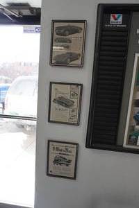 lot 317 image: Eight Vintage car ads