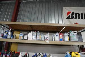 lot 8 image: Top Shelf-Gear grease, trans oil & coolant