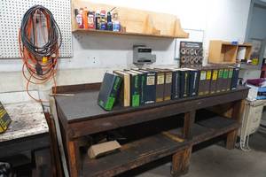 lot 27 image: Work bench and wood wall shelf