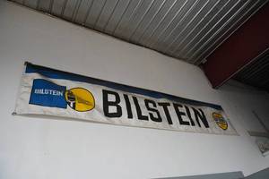lot 31 image: Bilstein Banner on wall above door