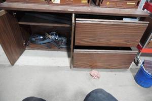 lot 47 image: Two door, two drawer cabinet with hoses
