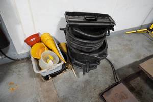 lot 77 image: Poly Oil drain pans and funnels