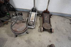 lot 97 image: Two floor jacks and brake bleeder unit