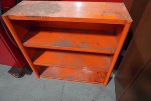 lot 110 image: Orange four shelf metal unit