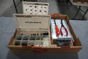 lot 165 image: Plastic rivets and tools