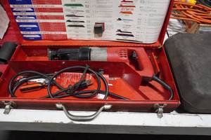 lot 203 image: Milwaukee Sawzall wblades and case