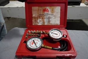 lot 211 image: Mac Tools transmission oil tester