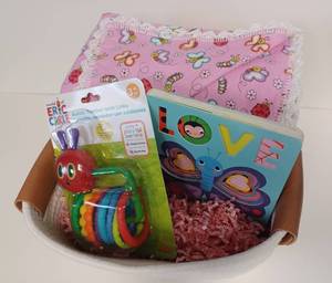lot 15 image: Pink Blanket Baby Basket
