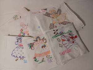 lot 88 image: Dutch Girl Hand Embroidered Day of the Week Dish Towiels