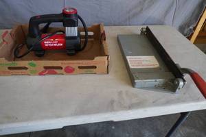 lot 151 image: 12 Volt air inflater & paper cutter