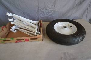 lot 162 image: Wheel barrow tire & 6 shelf brackets