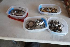 lot 165 image: 3) trays hose clamps, tray of brass fittings