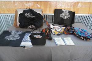 lot 41 image: Harley Davidson Suspenders,hats, bags, flags