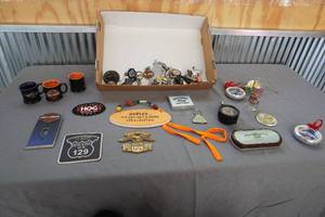 lot 51 image: Harley Davidson Key chains, tire tester, shot glasses