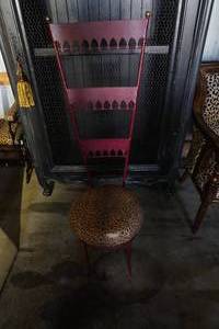 lot 13 image: Round Leopard Print Chair with tear in seat