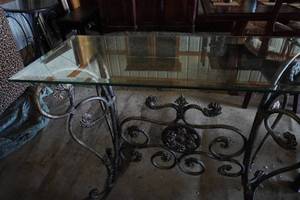 lot 16 image: Wrought Iron Glass Top Table 33 X 45 L X 17 H