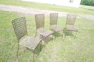 lot 70 image: Four Matching metal framed caned patio chairs