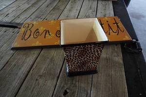 lot 87 image: Cheetah print waste basket &amp Bon Appetite wood sign