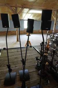 lot 93 image: Four Bose double speakers floor stands