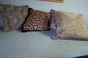 lot 97 image: Four various print pillows
