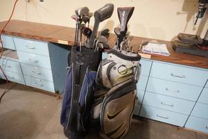 lot 19 image: Two set of Golf Clubs, bags and golf balls